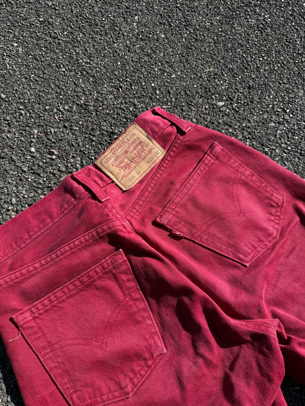 Vintage 90s Levi’s 534 02 Red Denim Jeans made in UK