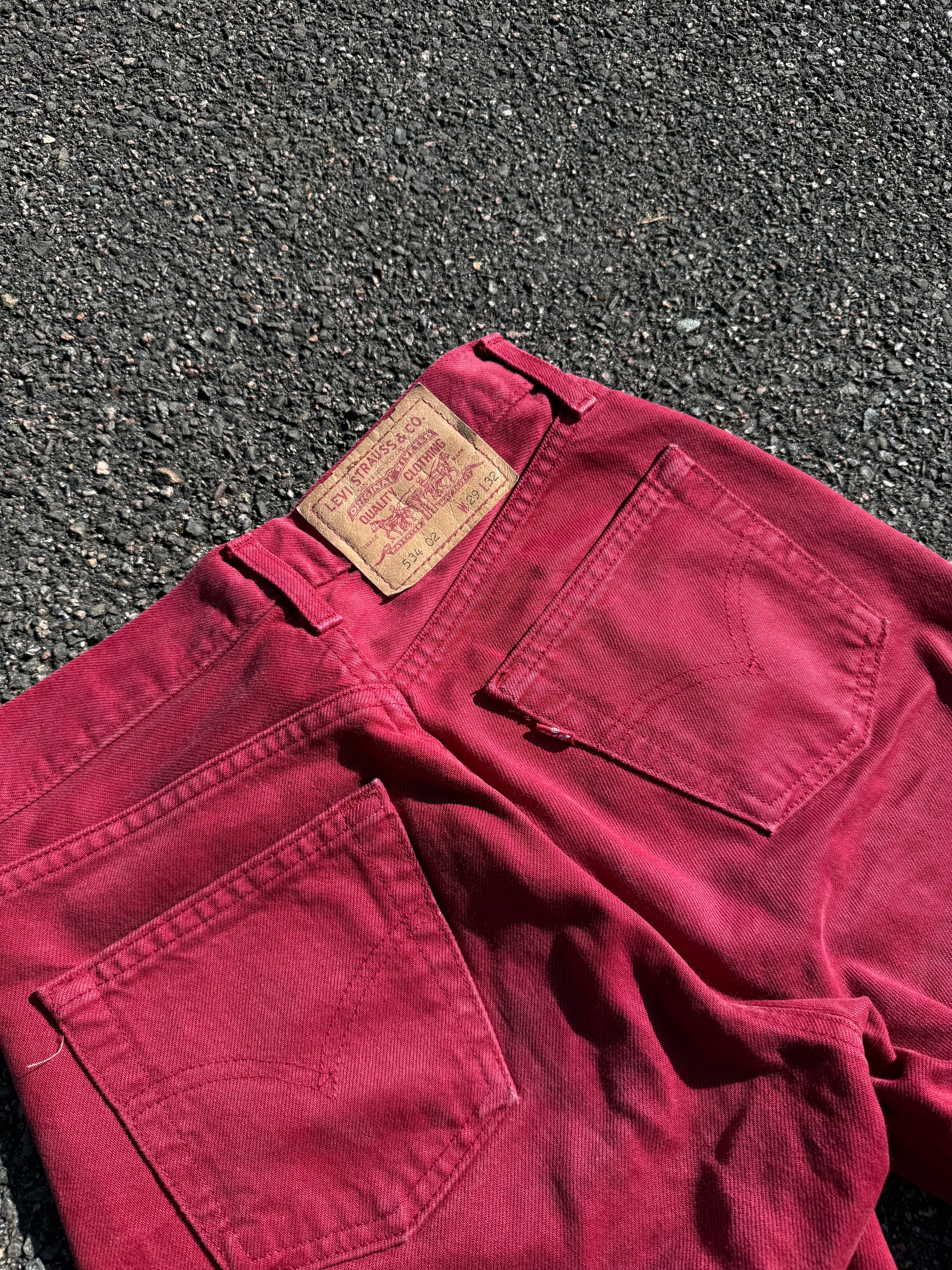 Vintage 90s Levi’s 534 02 Red Denim Jeans made in UK